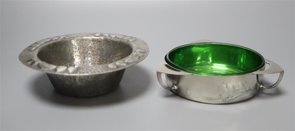 A Libertys Tudric pewter bowl and a butter dish, hammered design, shape no. 0187, 15.5cm diameter, the three handled bowl with green